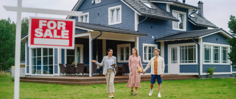 image of a house with a for sale sign in the front, with three people walking towards the sign